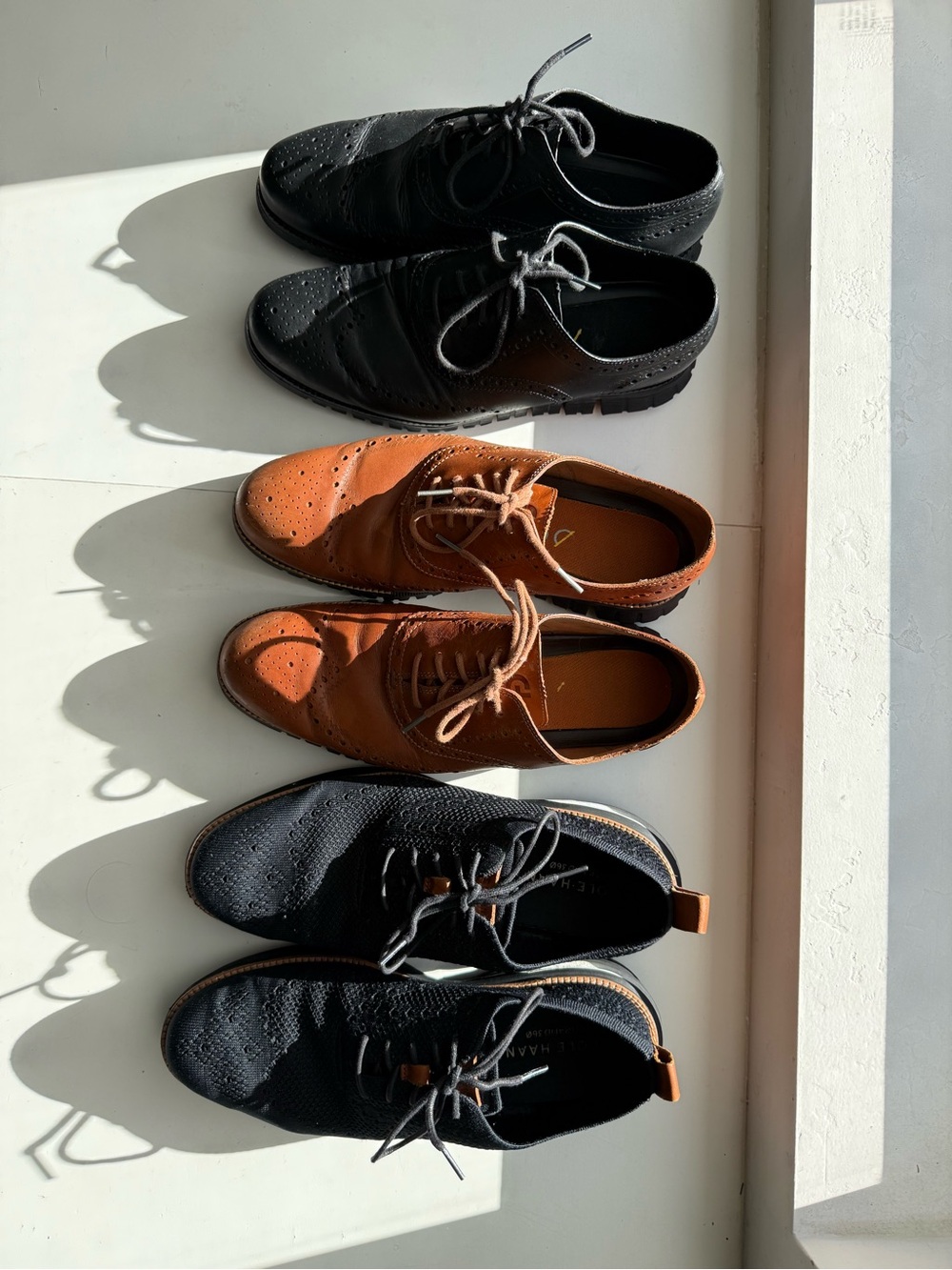 Cole Haan Two-Tone Leather & Textile Oxfords in Black and Brown. Zero Grand